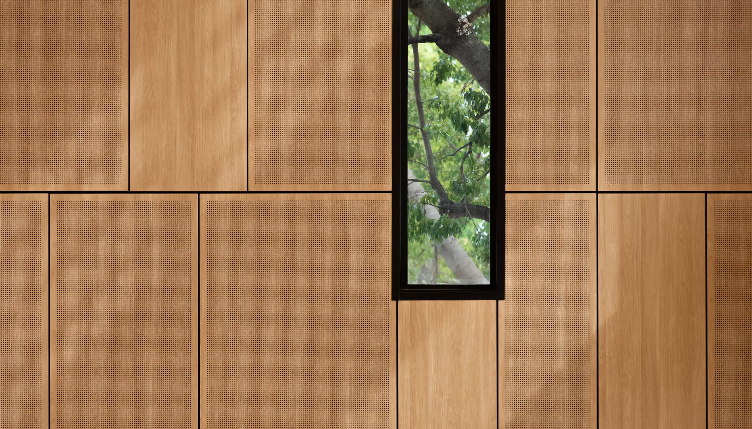 rWood - Perf — Perforated acoustic wood panels with FSC-certified veneer. Perforation patterns tuned for broadband absorption and a strong visual rhythm.